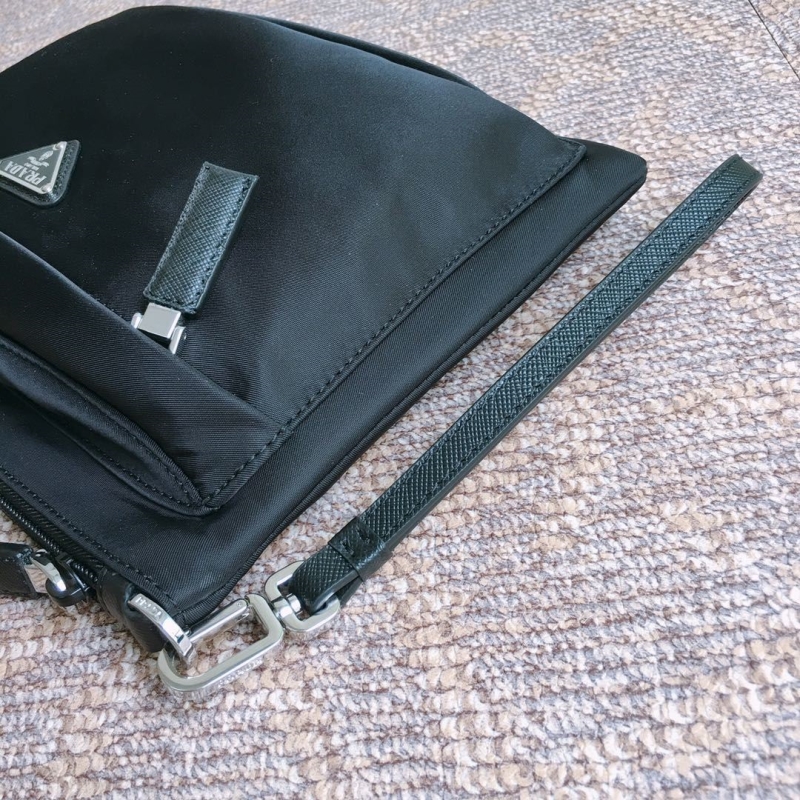 Pra*a clutch bags